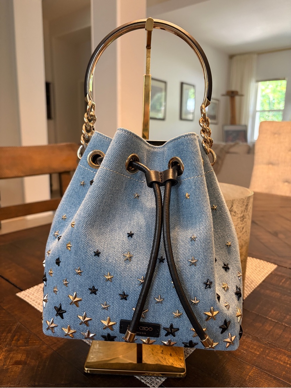 Jimmy Choo Denim Bon Bon Bucket Bag embellished with mixed metallic st